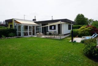 klimatisiertes Ferienhaus mit Wintergarten & Saunahaus – Ihr Rückzugsort in Trausdorf am See Bild